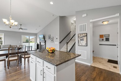 Granite counters, gas stove, ss appliances with a kitchen window.