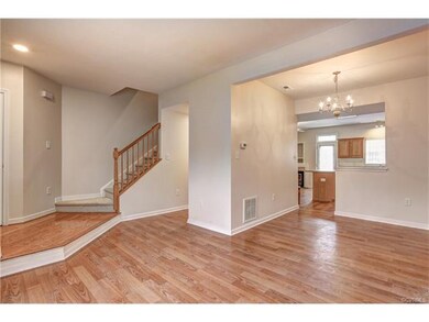 Living room opens into dining room. All neutral pa