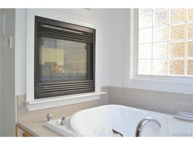 Master luxury bath, jetted tub, double sided firep