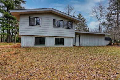 Back of house featuring board and batten siding