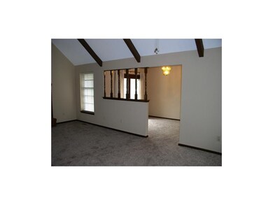 Living room with a view of the dining room