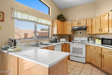 Kitchen overlooks Backyard