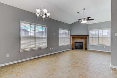 Unfurnished living room with healthy amount of nat