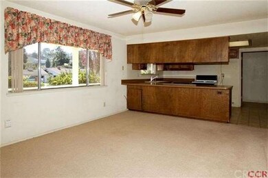 Sunny family room at front of house.