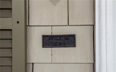This plaque is on the house, but it is not in the