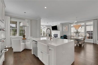 Kitchen featuring hanging light fixtures, a kitche