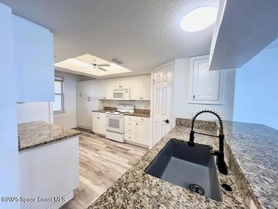 Oleander Pointe Condominums unit 205, Cocoa, FL 32922 - photo 3