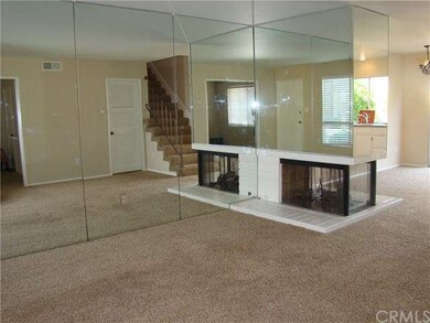 Spacious living room with new paint, new blinds, a