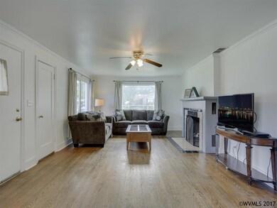 Hardwoods, fireplace, coat closet, vinyl windows