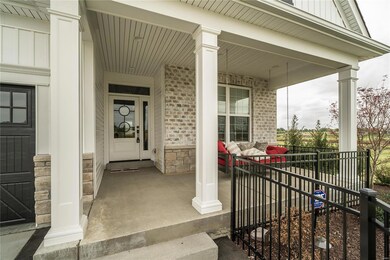 Front Elevation- Over sized front porch with swing- Fencing will be removed before closing