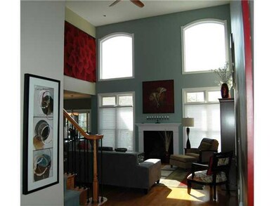 Great Room Soaring 19  ceilings and a wall of wind