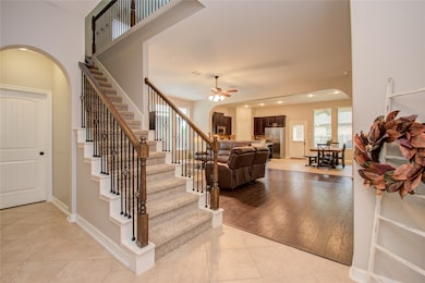 STAIRCASE LEADS TO LARGE BONUS ROOM WITH FULL BATHROOM!