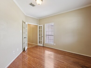 French doors in the Study ensure privacy for those