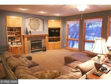 Relax by a fire in the main floor family room whil