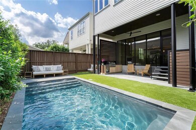 Pool with landscaped yard
