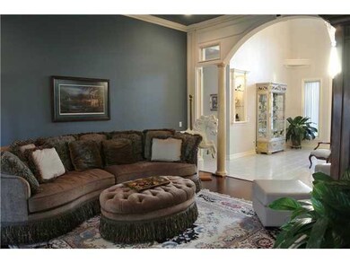 Living Room. Newer hardwood floors accentuate this