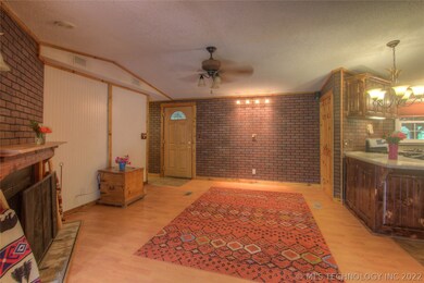 The front living area has a fireplace and custom b