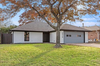 View of front facade featuring a front yard and a 
