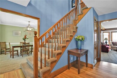 Walk into this wide foyer that opens into the down