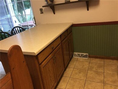 There is storage under the peninsula with pull-out