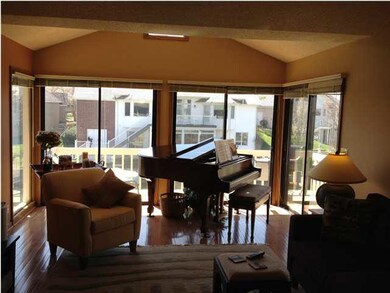 With a 3-way woodburning fireplace, this vaulted g