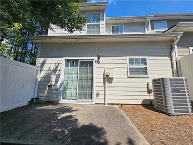 Rear view of house featuring a patio