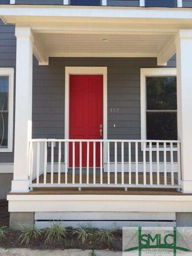 E 32nd Street front porch and entry
