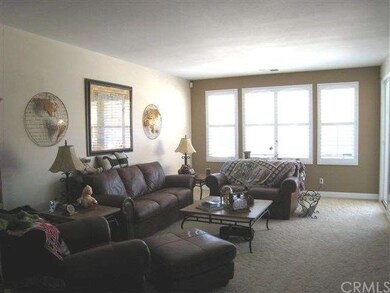 Formal living room with slider to patio.