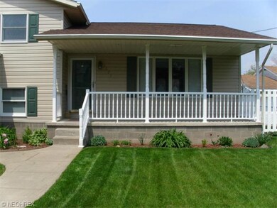 Enjoy the warm days on the spacious front porch.