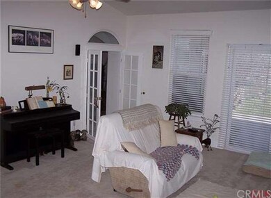 Another view of the living room with french doors 