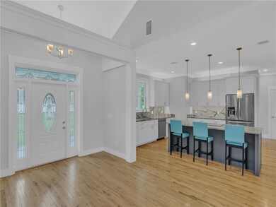 Front entrance and kitchen