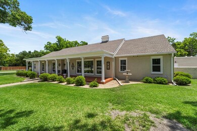 View of front of property featuring a chimney, br