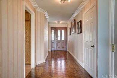 You enter this home via this large hallway with ha