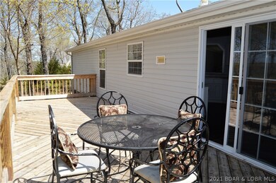 Enjoy the beautiful wooded setting from your large
