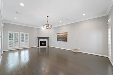 Large living room with fireplace. Tons of natural