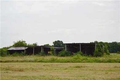Lots of storage sheds on property