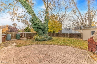 Fenced backyard featuring a patio