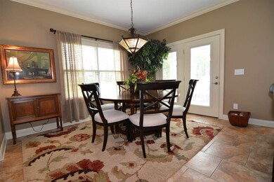 Dining room is conveniently located just off the k