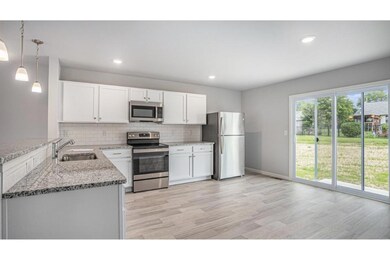 The dining nook can accommodate a large table and 