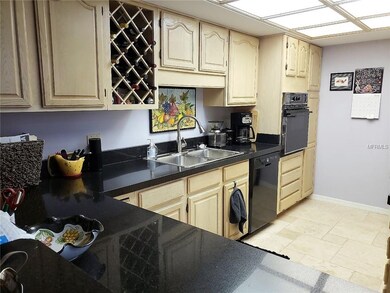 Kitchen with breakfast bar.
