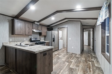 The hall to the PRIMARY BEDROOM with its own full bath!