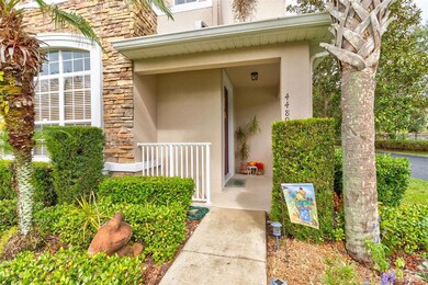 Welcoming entry with stacked stone and fresh mulch