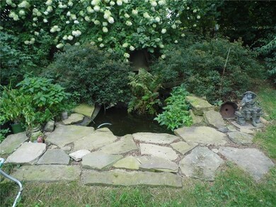 TRAQUIL SETTING ENHANCES KOI POND