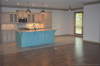 Living area open to kitchen and breakfast nook