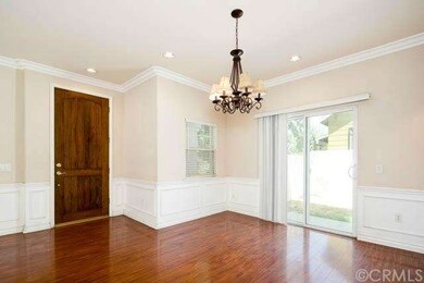 Entry, dining area, sliders to side garden