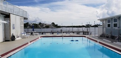 community pool with water views on the Sutherland 