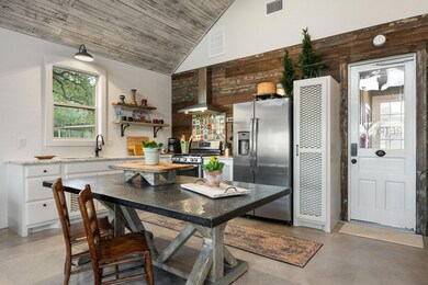 Kitchen featuring appliances with stainless steel