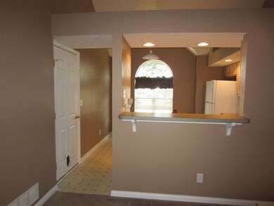 Breakfast bar with a past through window.