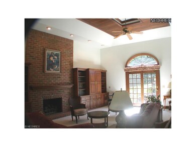 French doors lead to brick patio
