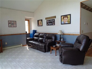 Living room with cathedral ceiling.